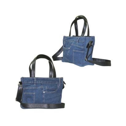 Side view of denim leather handbag with adjustable shoulder strap for everyday use