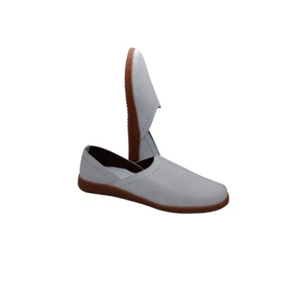 Side view of white genuine leather ladies slip-on nagra shoes with brown sole – made in Bangladesh