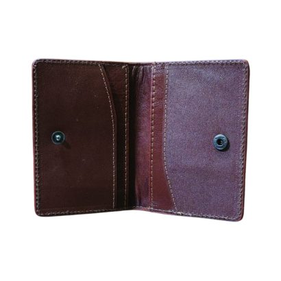 Inside view of a brown genuine leather wallet featuring card slots, secure button closure, and stitched premium finish.