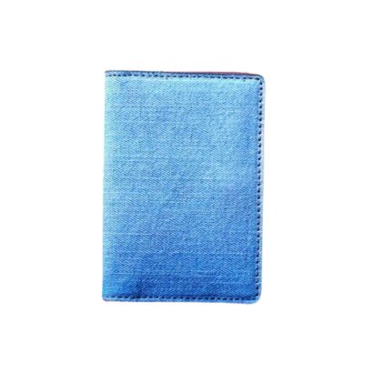 Light blue fabric-texture men’s wallet with clean stitching and minimalist design.