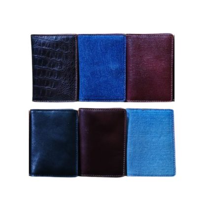 A collection of premium men’s leather wallets in multiple colors and textures including black, blue, maroon, and light blue.