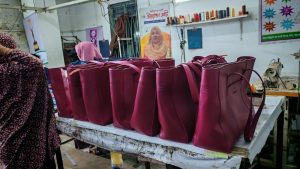 Shabab Leather showcases export-quality burgundy leather tote bags crafted in Bangladesh for a Spain-based buyer. Each bag is handmade with precision, reflecting top-tier craftsmanship and luxury design.