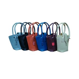 Six multicolor genuine leather women’s tote bags displayed in a row, premium handmade handbags by Shabab Leather.