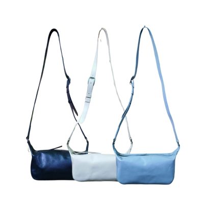 "Women's premium leather shoulder bags in black, white and sky blue – minimalist sling purses for casual & formal use"