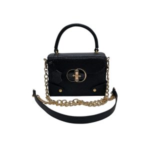 Black textured women’s leather handbag with gold chain strap, top handle, and gold twist-lock closure.