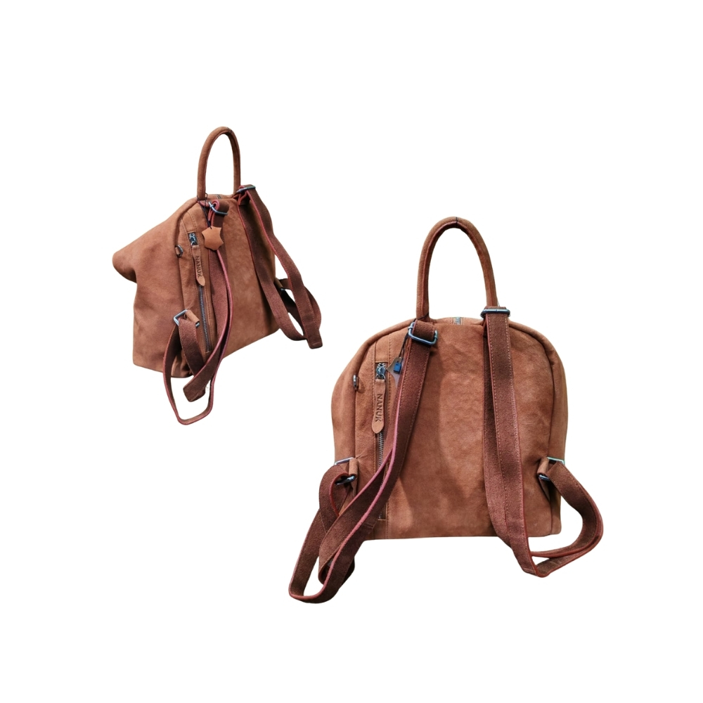 Brown leather ladies backpack handcrafted in Bangladesh with adjustable straps and zipper closure