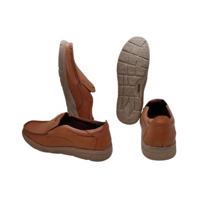 Side and sole view of brown leather men’s slip-on shoe with non-slip outsole