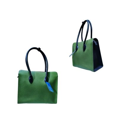 Green women’s leather tote bag with black handles shown from front and side angles.
