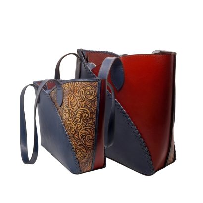“Handcrafted women’s leather tote bags in blue and maroon with floral embossed design, shown in two different sizes.”