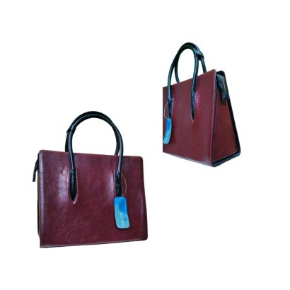 Maroon women’s leather tote bag with black handles shown from front and side angles.