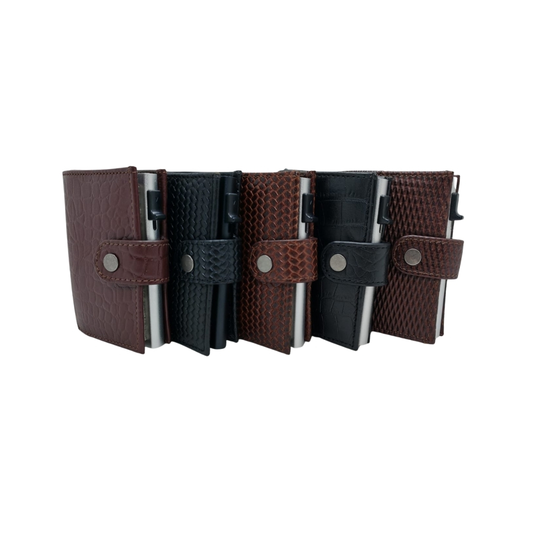 Multiple men’s leather card holder wallets in brown and black with textured patterns and metal button closure, displayed side by side.