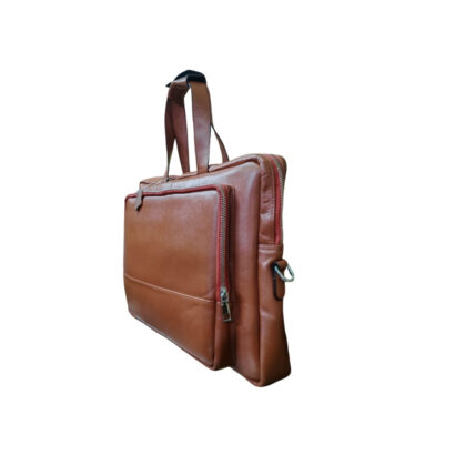 Side view of brown genuine leather laptop bag showing thickness and compartments – Made in Bangladesh | Shabab Leather