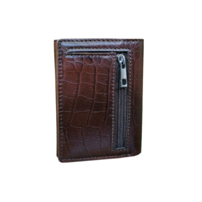 Compact brown leather wallet with crocodile texture pattern and front vertical zipper pocket.