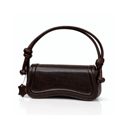 Dark brown leather shoulder handbag with curved flap and knotted straps on white background