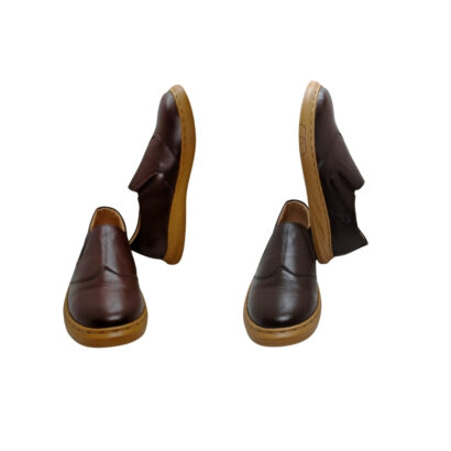 Front and side view of men’s brown genuine leather slip-on shoes with durable sole on white background