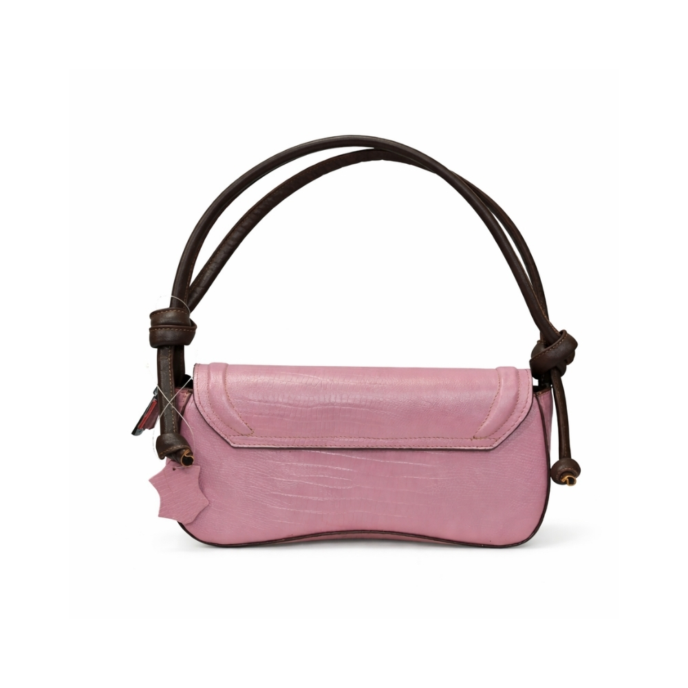 Back view of pink leather shoulder handbag with curved structure and dark brown knotted straps