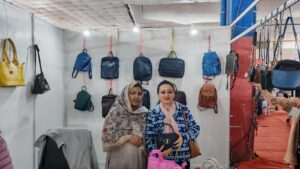 Visitors at Shabab Leather stall showcasing handmade leather bags during Kathmandu Business Expo 2026